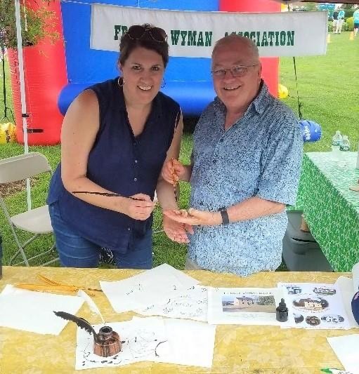 Pam M. and Jon W. at the Celebrate Burlington Wyman booth