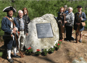 FWA leaders gather for the rededication of the Amos Wyman memorial